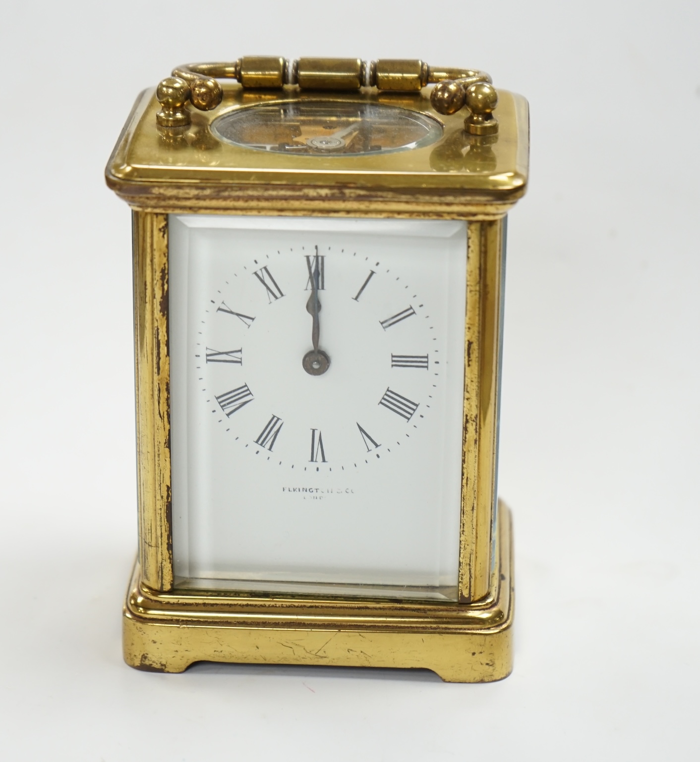 A carriage timepiece, dial stamped Ellington and Co, (with purchase receipt), 10cm high. Condition - case fair, not tested as working